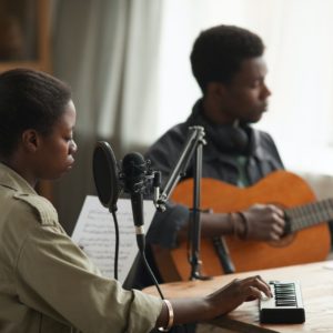 African-American Couple Recording Music Together